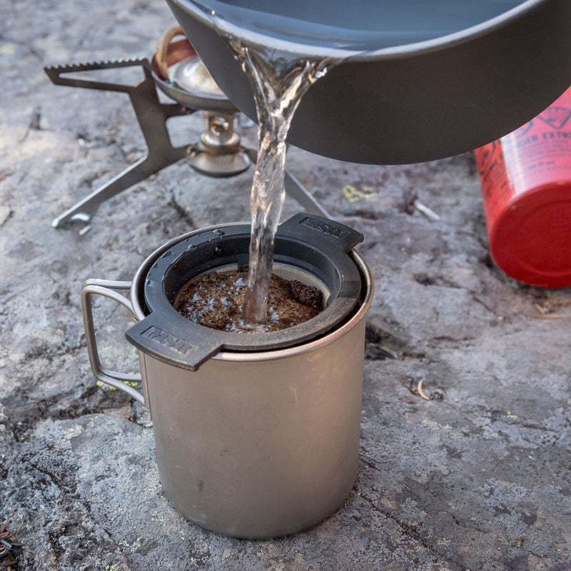 MugMate Coffee/Tea Filter being used with MSR Titan Mug & cookware